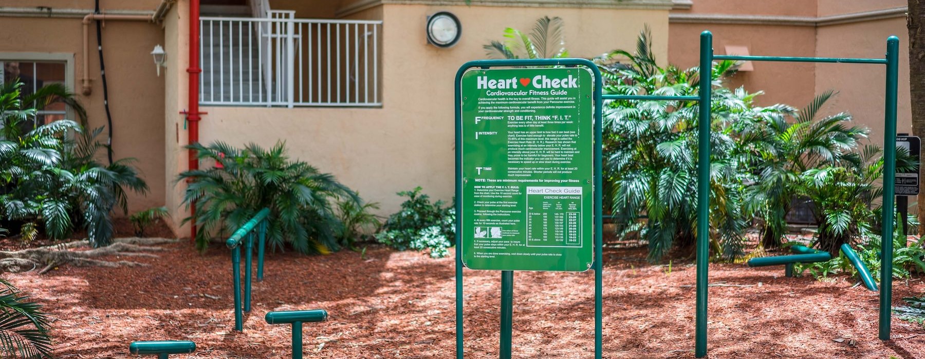 a jungle gym in front of a building