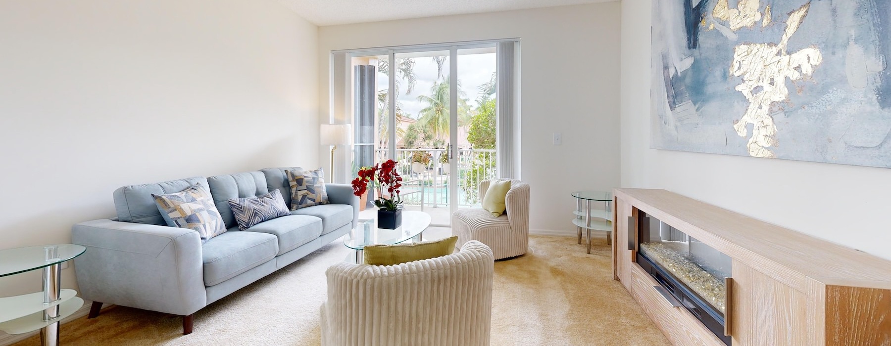 a living room with a couch and a table